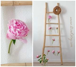 Houten trap zelf decoreren met verse pioenrozen.